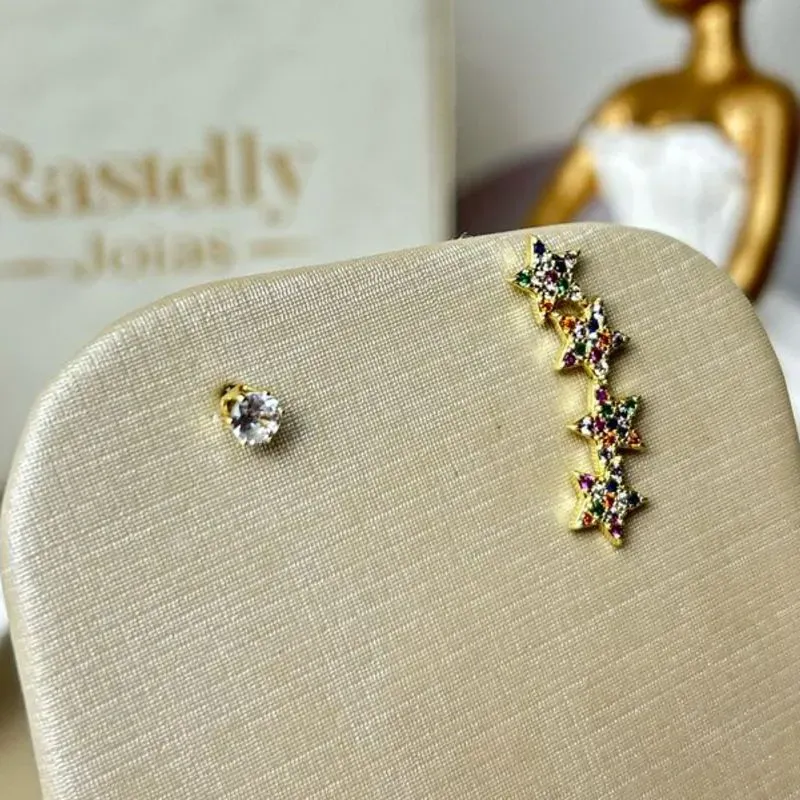 Brinco Ear Cuff Unico Estrelas com Solitario Banhado a Ouro