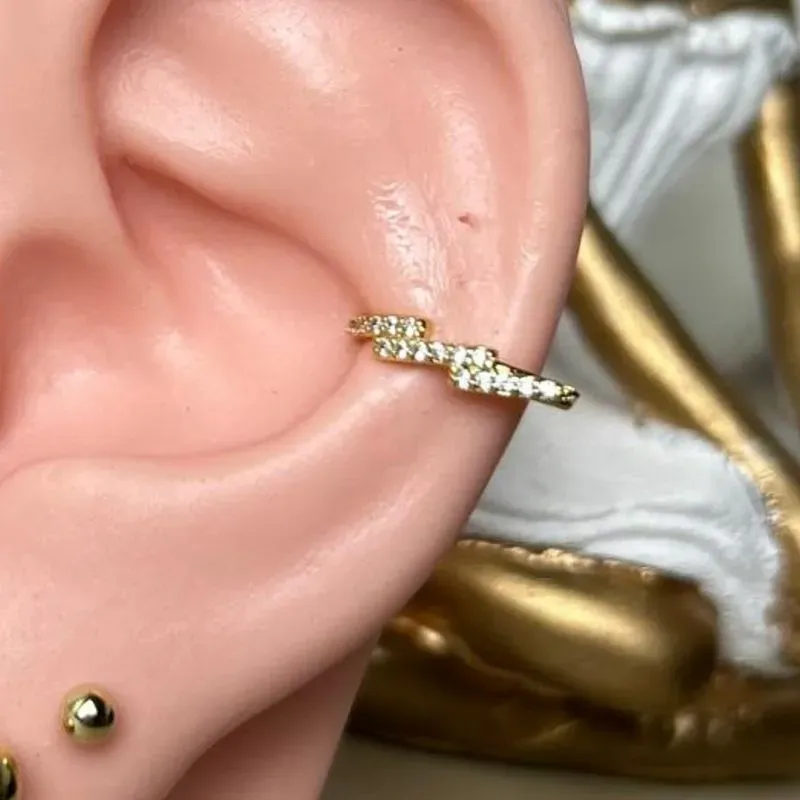 Piercing Fake Raio Cravejado banhado a Ouro