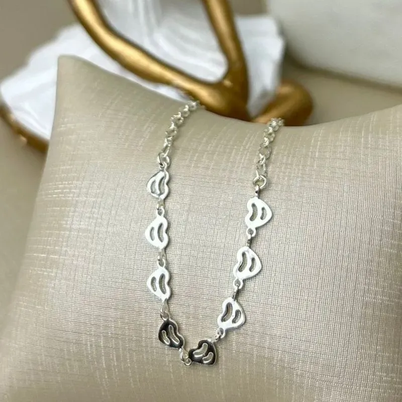 Tornozeleira  Coração Liso Banhado a Prata