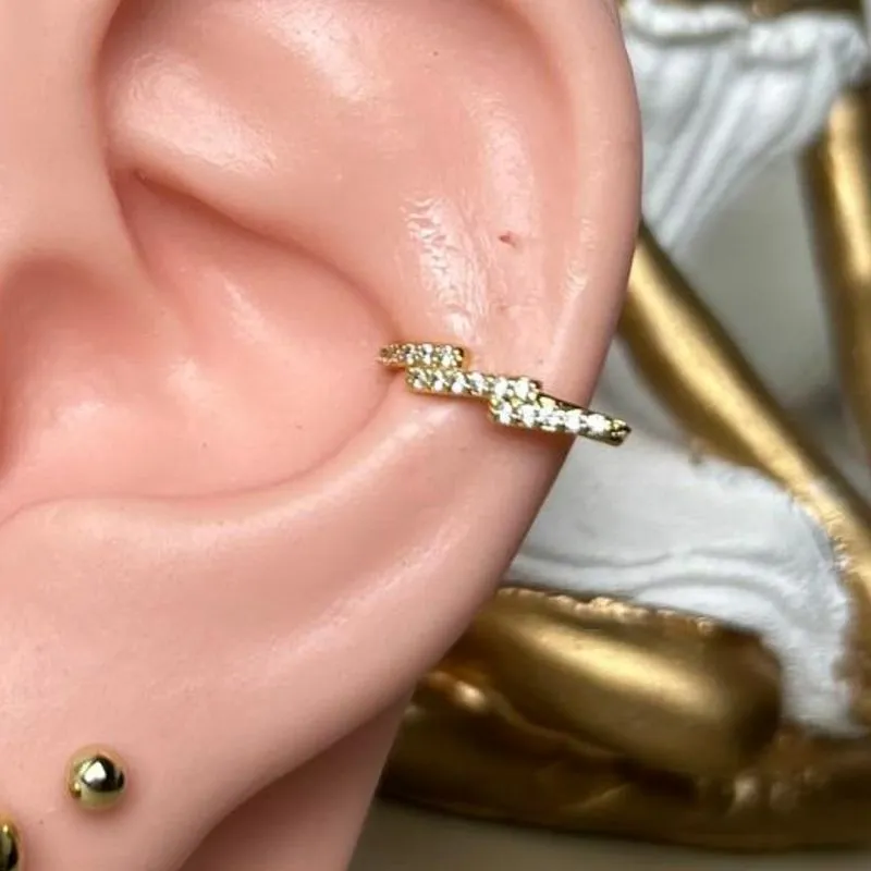 Piercing Fake Raio Cravejado banhado a Ouro