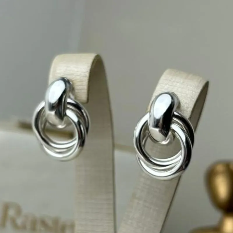 Brincos  Elos Cruzados Banhado a Prata